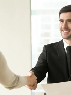 boss-congratulating-female-employee-with-promotion